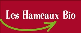 Logo des Hameaux Bio, fond rouge avec texte blanc et flèche verte